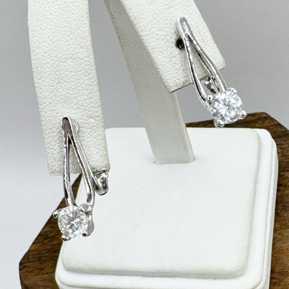 Sterling silver rhodium plated clip on earrings sparkling crystal solitaire